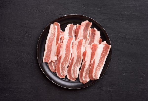 Raw sliced bacon, top view